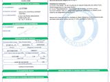 a green and white identification card with a barcode on it