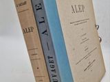 two books sitting on top of each other on a table
