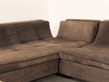 a brown couch with a recliner on it in a living room