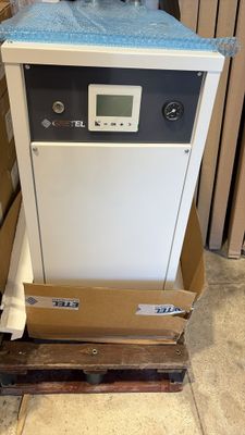 a machine that is sitting on top of a cardboard box