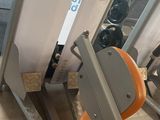 a machine that is sitting on the floor in the gym