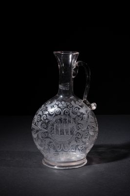 a glass vase that is sitting on a table