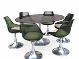 an image of a dining table with four chairs and a glass top