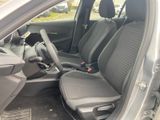 a car that has two seats in the front and one in the back