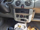 a car dashboard with a car radio and other items in it