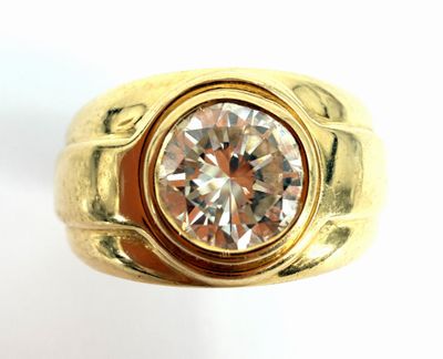 an image of a gold ring with a diamond in the center
