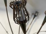 a close up view of a chandelier made of metal