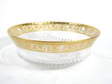 a close up of a glass bowl on a white surface