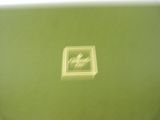 a picture of a green box with a logo on it