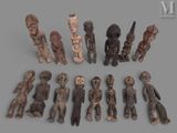 an image of a group of wooden figurines sitting on top of a table