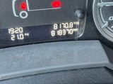 a close up of a speedometer on a car dashboard
