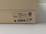 a white box with a label on it sitting on a table