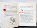 an open book with a picture of a man and a woman