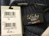 a label on a sweater that says lady