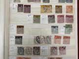 un livre avec beaucoup de timbres