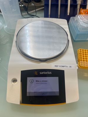 a scale that is sitting on a glass table