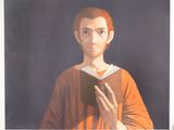 tableau représentant un homme tenant un livre entre ses mains