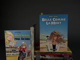 two books that are sitting next to each other on a table