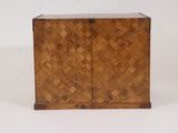an image of a small wooden box with a door on top of it