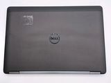 dell laptop computer sitting on top of a table with a white background