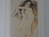 a picture of a painting of a nude woman on a wall