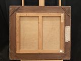 an old painting is sitting on a wooden easel on a black background