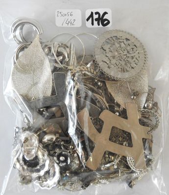 a bag of assorted silver and gold jewelry