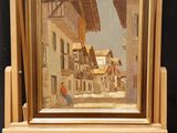 an image of a painting on a easel in front of a black background