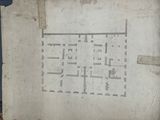 a piece of paper with a drawing of a building on it