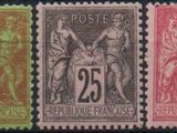 a group of four stamps with different colors and designs on them