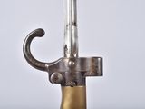 a close up of a metal object with a metal handle