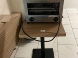 a toaster oven sitting on a table in a kitchen