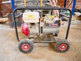an image of a small engine on a cart in a garage