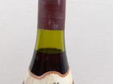 a bottle of wine that is sitting on a table