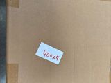 a box with a sticker on it sitting on a table