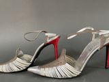a close up of a pair of shoes on a gray surface