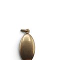 an image of a gold oval pendant on a white background