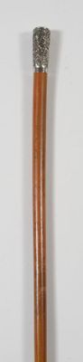 Canne décorative à fût en jonc de Malacca, pommeau milord en feuille d