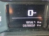 a close up of a car dashboard with a speedometer