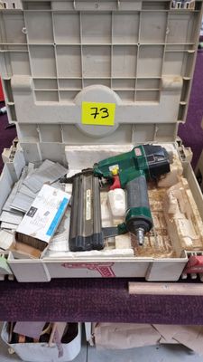 a tool box with tools in it on a table