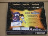 packaging for a pokemon trading card game with a purple and black character