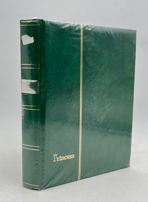 an old green book with a gold trim on the cover