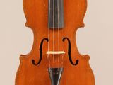 an old violin with a bow on a white background