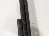 a metal object that is sitting on a white surface