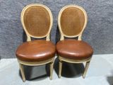 pair of antique french cane back chairs with leather seat cushions