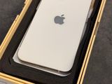 an apple iphone is in a box on a table