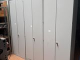 a room that has a bunch of lockers in it