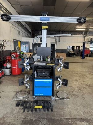 an image of a car being worked on in a garage