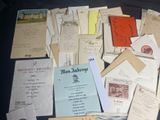 many old letters and envelopes on the table