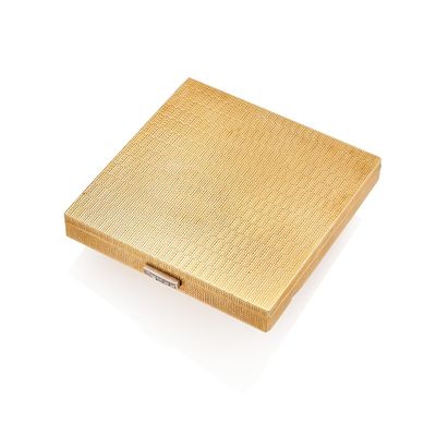 an image of a gold cigarette case on a white background